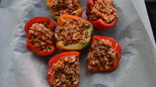 Рецепт Сладких перцев, запеченных с мясом и рисом