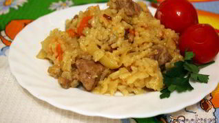 Рецепт Ароматной рисовой каши с мясом и капустой