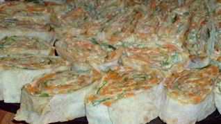 Рецепт Рулетиков из лаваша с ветчиной, зеленью и сыром