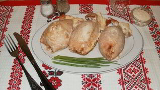 Рецепт Фаршированного кальмара с рисом и яйцом